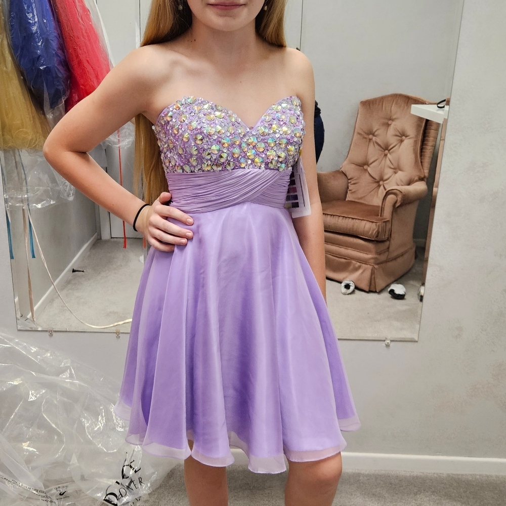 Damas by Tiffany designs prom dress